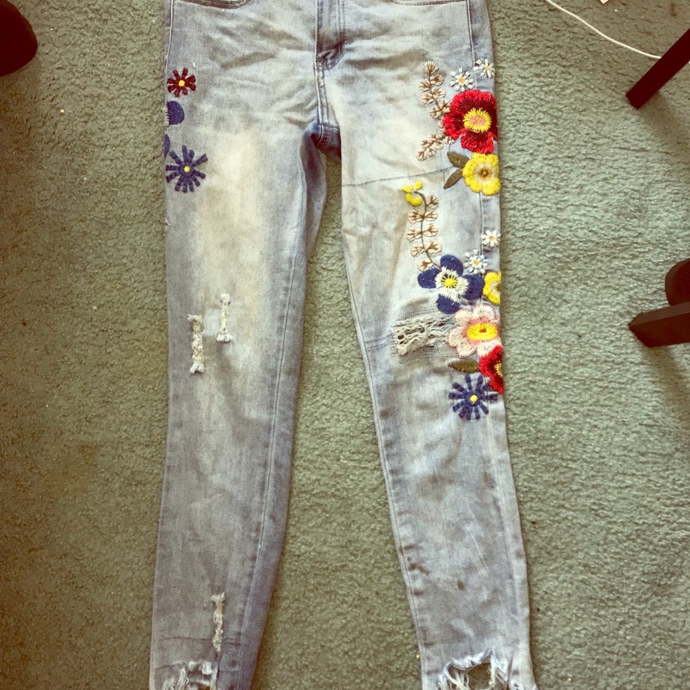Used floral-print distressed ankle jeans